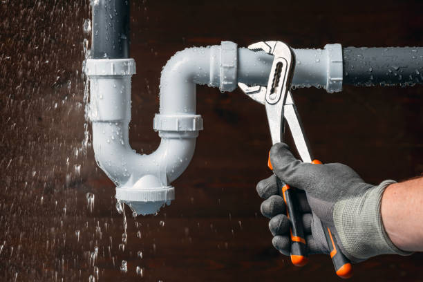 Professional Emergency Plumber technician working in Milford, PA